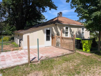Charming Home Just 15 Minutes from Traverse City!  This on Interlochen Golf and Country Club in Michigan - for sale on GolfHomes.com, golf home, golf lot