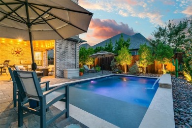 Step into refined luxury with this exquisite one-story residence on The Tribute At the Colony in Texas - for sale on GolfHomes.com, golf home, golf lot