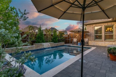 Step into refined luxury with this exquisite one-story residence on The Tribute At the Colony in Texas - for sale on GolfHomes.com, golf home, golf lot