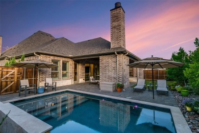 Step into refined luxury with this exquisite one-story residence on The Tribute At the Colony in Texas - for sale on GolfHomes.com, golf home, golf lot
