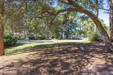 Build your coastal retreat on this .33-acre waterfront lot in on Lockwood Folly Country Club in North Carolina - for sale on GolfHomes.com, golf home, golf lot