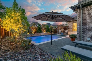 Step into refined luxury with this exquisite one-story residence on The Tribute At the Colony in Texas - for sale on GolfHomes.com, golf home, golf lot