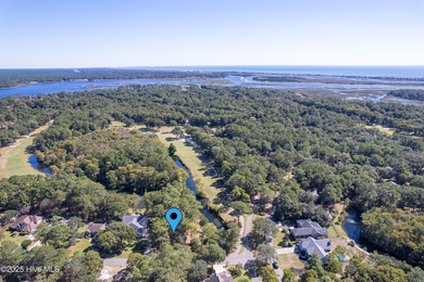 Build your coastal retreat on this .33-acre waterfront lot in on Lockwood Folly Country Club in North Carolina - for sale on GolfHomes.com, golf home, golf lot