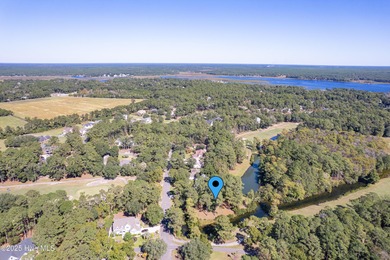 Build your coastal retreat on this .33-acre waterfront lot in on Lockwood Folly Country Club in North Carolina - for sale on GolfHomes.com, golf home, golf lot