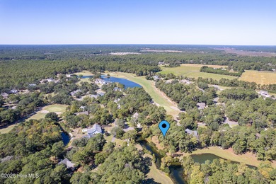 Build your coastal retreat on this .33-acre waterfront lot in on Lockwood Folly Country Club in North Carolina - for sale on GolfHomes.com, golf home, golf lot