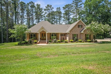 Custom home nestled on a 2.5-acre lot surrounded by a lush on Bay Springs Country Club in Mississippi - for sale on GolfHomes.com, golf home, golf lot