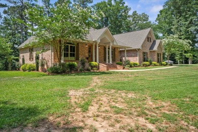 Custom home nestled on a 2.5-acre lot surrounded by a lush on Bay Springs Country Club in Mississippi - for sale on GolfHomes.com, golf home, golf lot