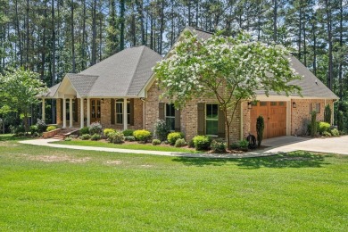 Custom home nestled on a 2.5-acre lot surrounded by a lush on Bay Springs Country Club in Mississippi - for sale on GolfHomes.com, golf home, golf lot
