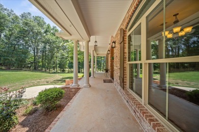 Custom home nestled on a 2.5-acre lot surrounded by a lush on Bay Springs Country Club in Mississippi - for sale on GolfHomes.com, golf home, golf lot