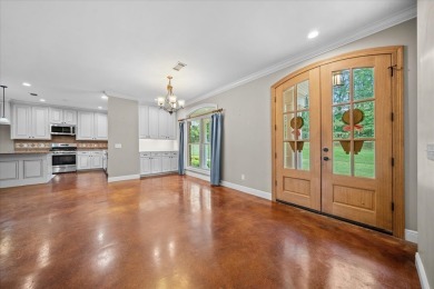 Custom home nestled on a 2.5-acre lot surrounded by a lush on Bay Springs Country Club in Mississippi - for sale on GolfHomes.com, golf home, golf lot