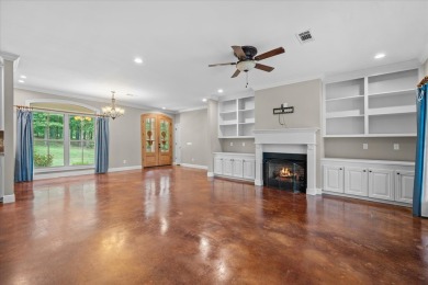Custom home nestled on a 2.5-acre lot surrounded by a lush on Bay Springs Country Club in Mississippi - for sale on GolfHomes.com, golf home, golf lot