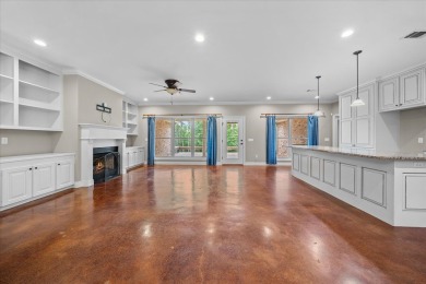 Custom home nestled on a 2.5-acre lot surrounded by a lush on Bay Springs Country Club in Mississippi - for sale on GolfHomes.com, golf home, golf lot