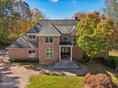 Experience refined luxury and serene privacy in this exceptional on Great Bear Golf and Country Club in Pennsylvania - for sale on GolfHomes.com, golf home, golf lot