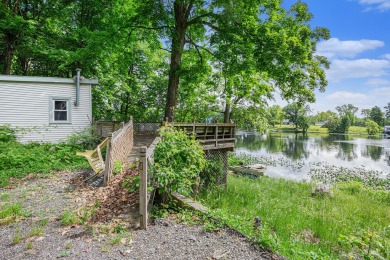 Geneva Lake frontage! This over 1.5 wooded acres property has on Orchard Hills Golf Course in Michigan - for sale on GolfHomes.com, golf home, golf lot