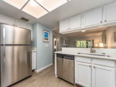 Welcome to this beautifully renovated first-floor 2-bedroom on East Lake Woodlands Country Club in Florida - for sale on GolfHomes.com, golf home, golf lot