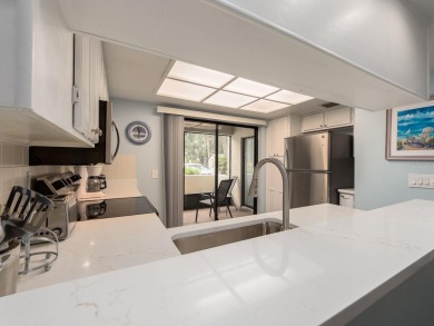 Welcome to this beautifully renovated first-floor 2-bedroom on East Lake Woodlands Country Club in Florida - for sale on GolfHomes.com, golf home, golf lot