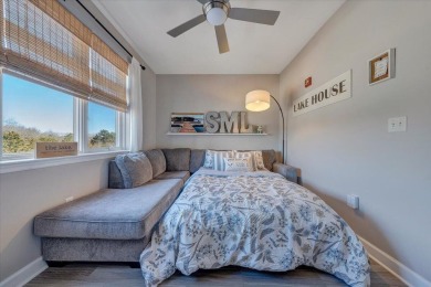 This fully furnished top-floor studio condo at The Pointe at on Mariners Landing Golf and Country Club in Virginia - for sale on GolfHomes.com, golf home, golf lot