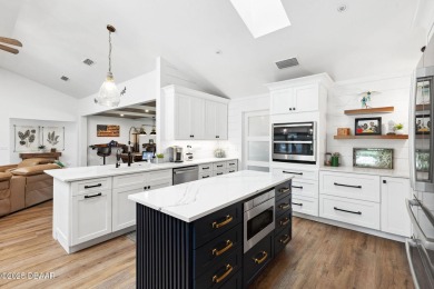 Sometimes, when you enter a truly special home, you just know on Indigo Lakes Golf Club in Florida - for sale on GolfHomes.com, golf home, golf lot
