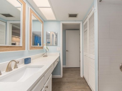 Welcome to this beautifully renovated first-floor 2-bedroom on East Lake Woodlands Country Club in Florida - for sale on GolfHomes.com, golf home, golf lot