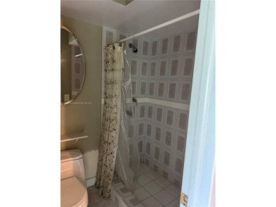 Discover the potential of this spacious 2 BR, 2 BTH corner condo on Sunrise Lakes Phase III in Florida - for sale on GolfHomes.com, golf home, golf lot