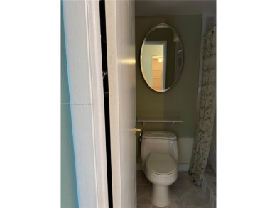 Discover the potential of this spacious 2 BR, 2 BTH corner condo on Sunrise Lakes Phase III in Florida - for sale on GolfHomes.com, golf home, golf lot