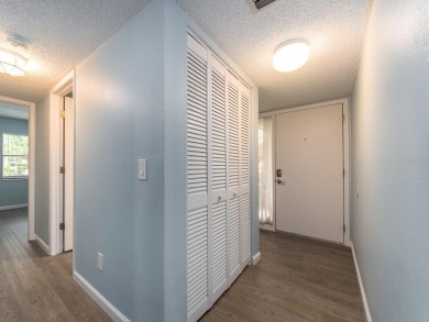 Welcome to this beautifully renovated first-floor 2-bedroom on East Lake Woodlands Country Club in Florida - for sale on GolfHomes.com, golf home, golf lot