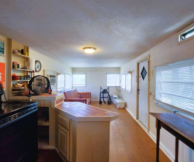 This WATERFRONT home is deemed 100% HABITABLE & ready for on Gulf Harbors Golf Course in Florida - for sale on GolfHomes.com, golf home, golf lot