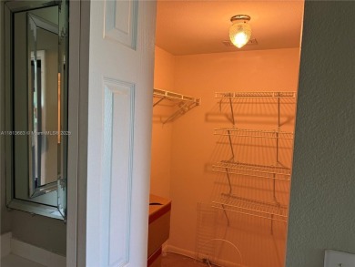 Discover the potential of this spacious 2 BR, 2 BTH corner condo on Sunrise Lakes Phase III in Florida - for sale on GolfHomes.com, golf home, golf lot