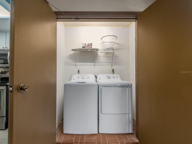 Welcome to this beautifully renovated first-floor 2-bedroom on East Lake Woodlands Country Club in Florida - for sale on GolfHomes.com, golf home, golf lot