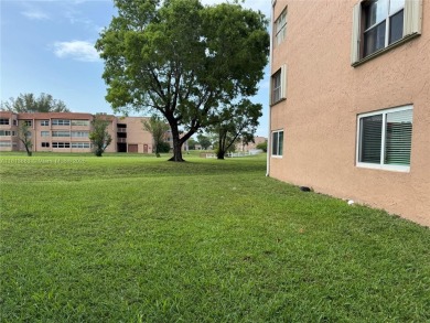 Discover the potential of this spacious 2 BR, 2 BTH corner condo on Sunrise Lakes Phase III in Florida - for sale on GolfHomes.com, golf home, golf lot