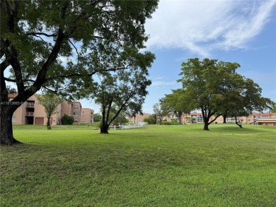 Discover the potential of this spacious 2 BR, 2 BTH corner condo on Sunrise Lakes Phase III in Florida - for sale on GolfHomes.com, golf home, golf lot