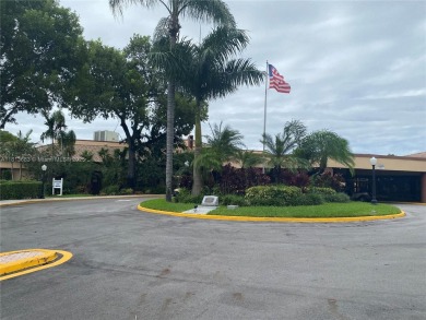 Discover the potential of this spacious 2 BR, 2 BTH corner condo on Sunrise Lakes Phase III in Florida - for sale on GolfHomes.com, golf home, golf lot