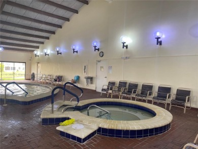 Discover the potential of this spacious 2 BR, 2 BTH corner condo on Sunrise Lakes Phase III in Florida - for sale on GolfHomes.com, golf home, golf lot