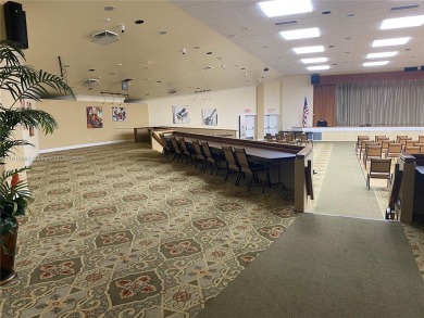 Discover the potential of this spacious 2 BR, 2 BTH corner condo on Sunrise Lakes Phase III in Florida - for sale on GolfHomes.com, golf home, golf lot
