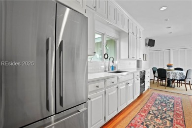 Just steps from the beach, this beautifully maintained 3-bedroom on Port Royal Golf and Racquet Club in South Carolina - for sale on GolfHomes.com, golf home, golf lot