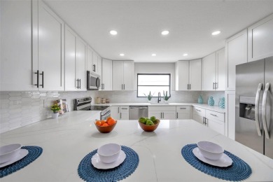 Spectacular golf course remodel! Plenty of room to add pool if on Palm Aire Country Club of Sarasota in Florida - for sale on GolfHomes.com, golf home, golf lot