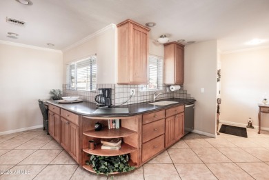 Beautifully maintained 2-bedroom, 2-bath duplex with a 2-car on Sun City Lakes West and East in Arizona - for sale on GolfHomes.com, golf home, golf lot