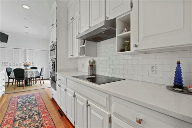 Just steps from the beach, this beautifully maintained 3-bedroom on Port Royal Golf and Racquet Club in South Carolina - for sale on GolfHomes.com, golf home, golf lot
