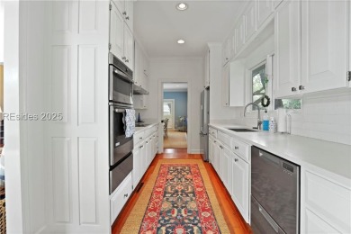 Just steps from the beach, this beautifully maintained 3-bedroom on Port Royal Golf and Racquet Club in South Carolina - for sale on GolfHomes.com, golf home, golf lot