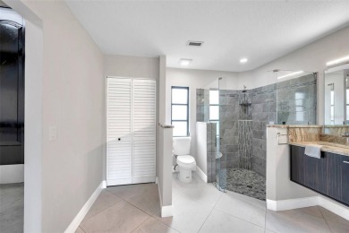 Spectacular golf course remodel! Plenty of room to add pool if on Palm Aire Country Club of Sarasota in Florida - for sale on GolfHomes.com, golf home, golf lot