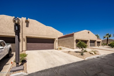This golf course townhome is the perfect worry-free, lock and on London Bridge Golf Course in Arizona - for sale on GolfHomes.com, golf home, golf lot