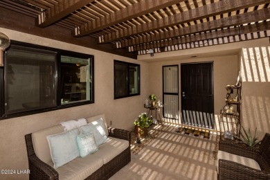 This golf course townhome is the perfect worry-free, lock and on London Bridge Golf Course in Arizona - for sale on GolfHomes.com, golf home, golf lot