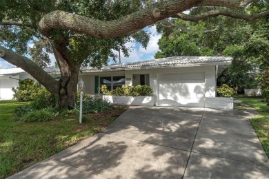 This beautiful renovated block-constructed home is in the 55+ on Mainlands Golf Club in Florida - for sale on GolfHomes.com, golf home, golf lot