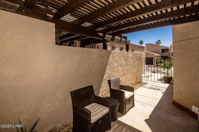 This golf course townhome is the perfect worry-free, lock and on London Bridge Golf Course in Arizona - for sale on GolfHomes.com, golf home, golf lot