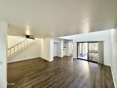 This golf course townhome is the perfect worry-free, lock and on London Bridge Golf Course in Arizona - for sale on GolfHomes.com, golf home, golf lot