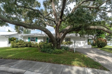 This beautiful renovated block-constructed home is in the 55+ on Mainlands Golf Club in Florida - for sale on GolfHomes.com, golf home, golf lot