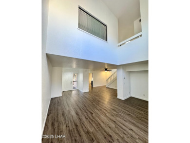 This golf course townhome is the perfect worry-free, lock and on London Bridge Golf Course in Arizona - for sale on GolfHomes.com, golf home, golf lot