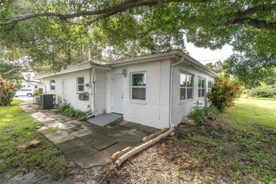 This beautiful renovated block-constructed home is in the 55+ on Mainlands Golf Club in Florida - for sale on GolfHomes.com, golf home, golf lot