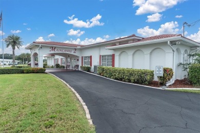 This beautiful renovated block-constructed home is in the 55+ on Mainlands Golf Club in Florida - for sale on GolfHomes.com, golf home, golf lot