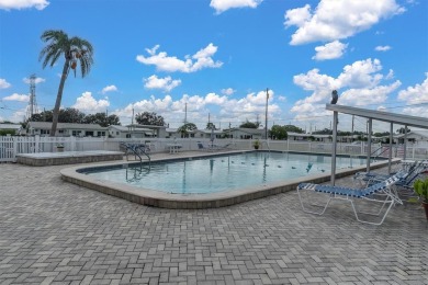 This beautiful renovated block-constructed home is in the 55+ on Mainlands Golf Club in Florida - for sale on GolfHomes.com, golf home, golf lot